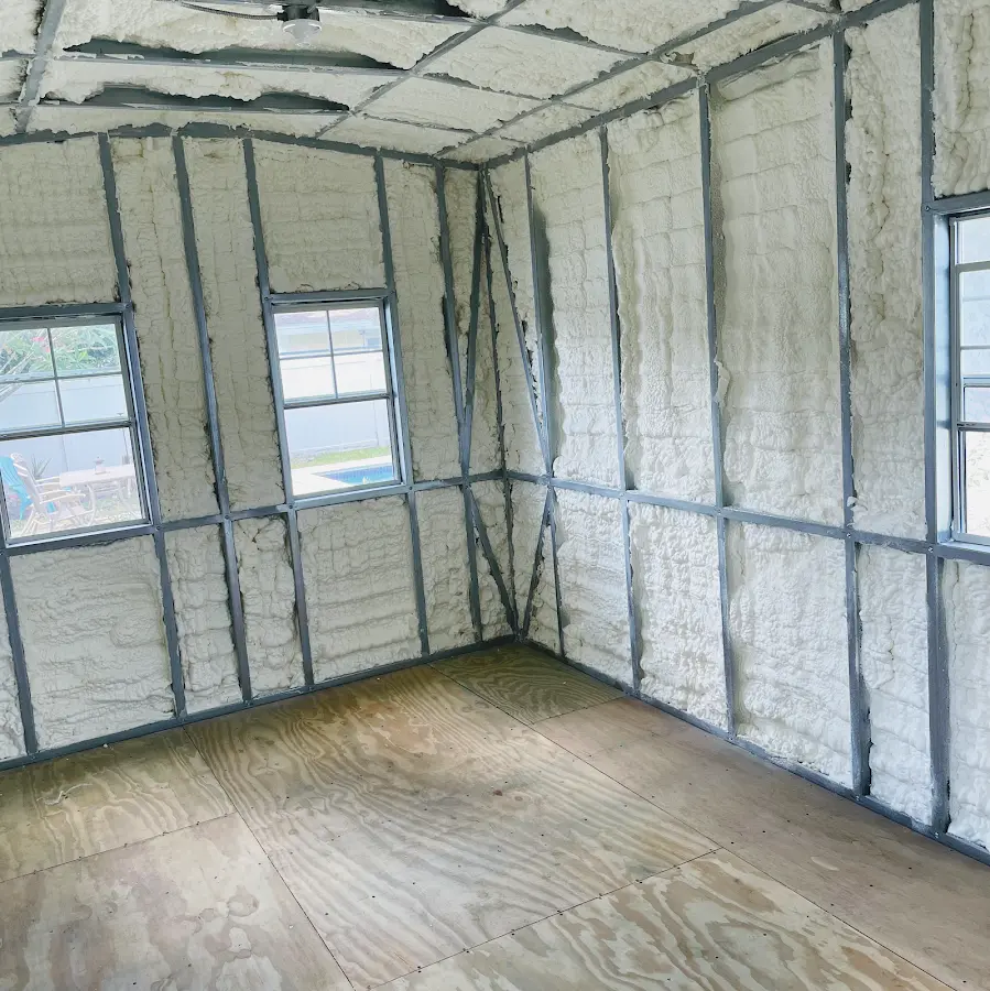 Closed-cell spray foam insulation applied to wall cavities in a residential project in Fairfax Station
